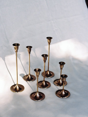 Set Of Seven Candlesticks, Antique Brass