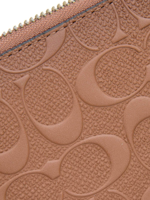 Coach Monogram Embossed Zipped Wallet