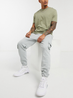 Asos Design Tapered Utility Cargo Sweatpants With 3d Nylon Pockets In Light Gray