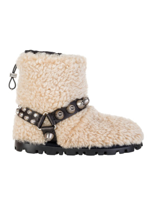 Miu Miu Studded Strap Detailed Shearling Boots