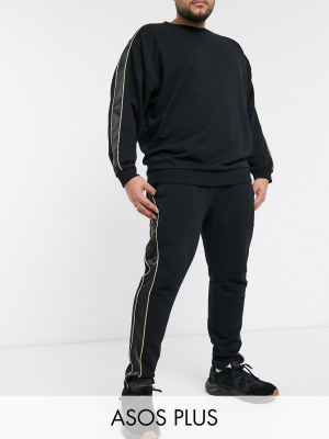 Asos Design Plus Two-piece Skinny Sweatpants With Satin & Gold Piping Side Stripe In Black