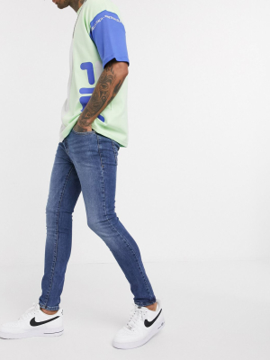 New Look Spray On Jeans In Mid Blue