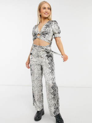 Moon River High Waist Belted Flared Pants In Snake Print