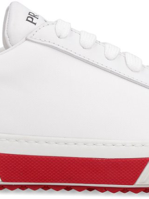 Prada Logo Embossed Low-top Sneakers