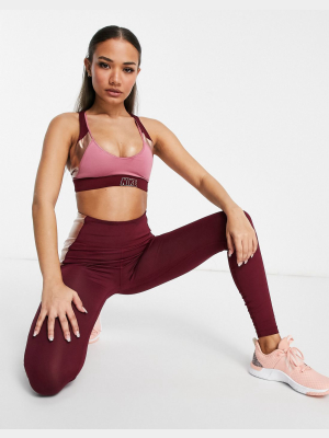 Nike Training Indy Logo Metallic Bra In Burgundy And Pink