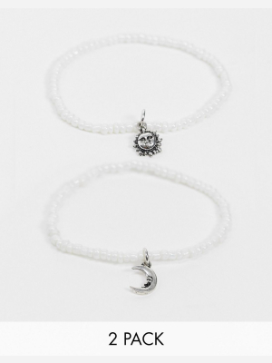 Asos Design Pack Of Two Stretch Bracelets With Moon And Sun Charms With Pearl Beads