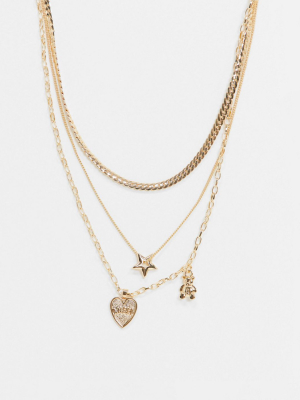 Asos Design Multirow Necklace With Star And Teddy Charms In Gold Tone