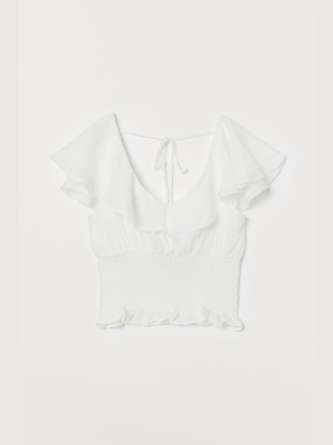 Smocked Top With Flounce