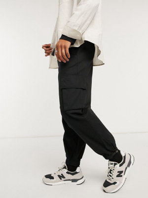 Asos Design Oversized Tapered Cargo Sweatpants In Black