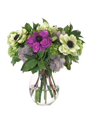 Purple And Green Anemone In Glass Vase