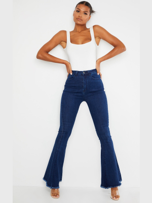 Indigo Raw Hem Extreme Bell Flare Jeans