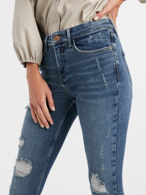 River Island Amelie Ripped Skinny Jeans In Mid Wash Blue