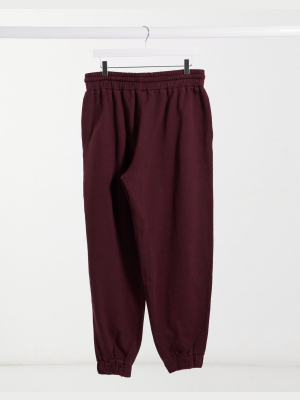 Asos Design Coordinating Super-oversized Sweatpants With Toggle Hem In Washed Burgundy