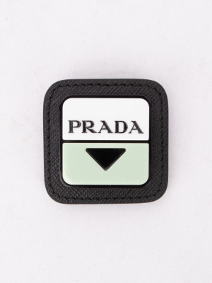 Prada Logo Embossed Brooch