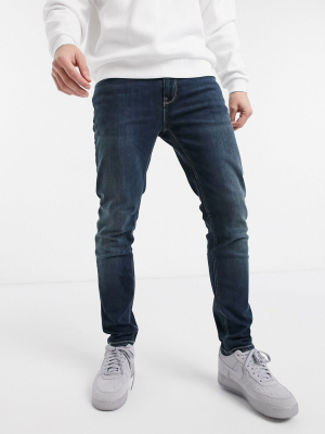 Asos Design Skinny Jeans In Dark Wash