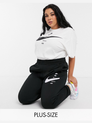 Nike Plus Swoosh Oversized Sweatpants In Black