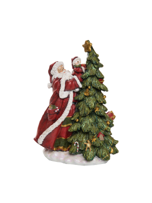 Transpac Resin 14 In. Multicolor Christmas Tree Santa