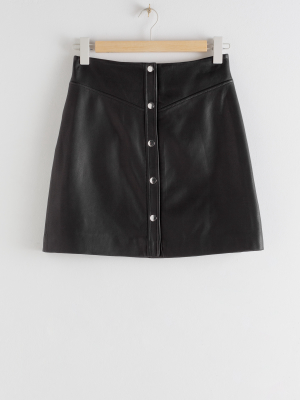 Leather Snap Button Mini Skirt