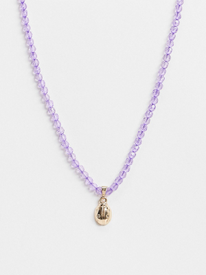 Asos Design Necklace With Ladybug Pendant And Lilac Plastic Beads