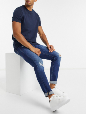 Jack & Jones Intelligence Slim Fit Jean With Rips In Mid Blue