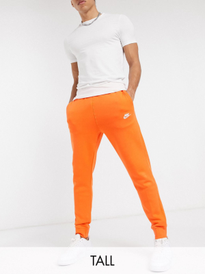 Nike Tall Club Cuffed Sweatpants In Orange