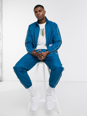 Puma Avenir Woven Track Top In Blue