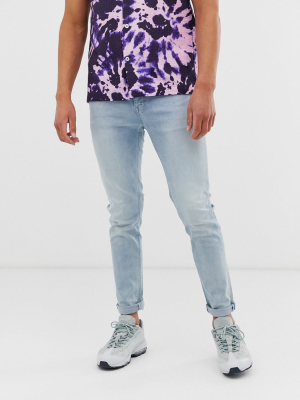 Asos Design Skinny Jeans In Light Wash Blue