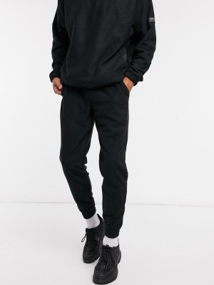 Asos Design Co-ord Tapered Polar Fleece Sweatpants In Black