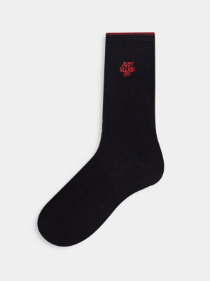 Asos Design Christmas Embroidered Slogan Calf Length Sock In Black