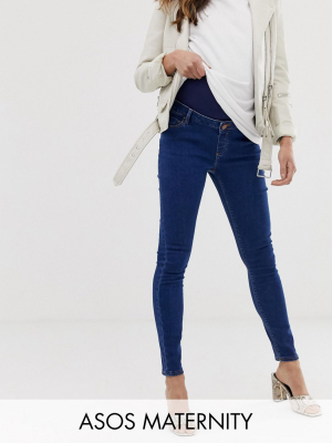 Asos Design Maternity High Rise Ridley 'skinny' Jeans In Rich Mid Blue Wash With Over The Bump Waistband