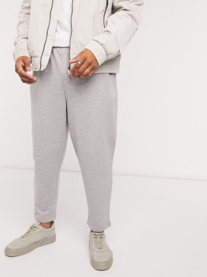 Asos Design Oversized Tapered Sweatpants In Gray Heather