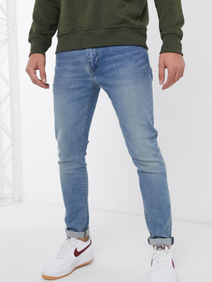 Levi's 512 Slim Tapered Fit Jeans In Pelican Rust Mid Wash