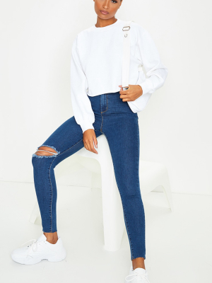 Prettylittlething Mid Blue Wash Raw Hem Knee...