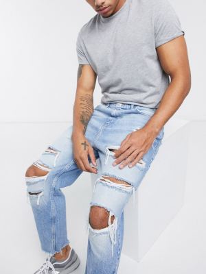 Bershka Loose Fit Jeans With Rips In Blue