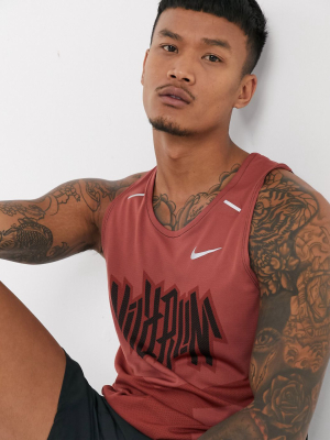 Nike Running Wild Run Logo Tank In Red