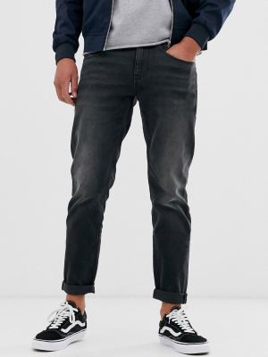 Asos Design Stretch Tapered Jeans In Washed Black