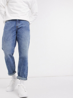 Topman Loose Fit Jeans In Mid Wash Blue