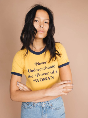 Never Underestimate The Power Of A Woman Ringer Tee