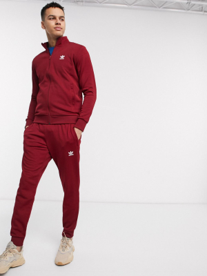 Adidas Originals Essentials Sweatpants Trefoil Logo In Burgundy Tricot
