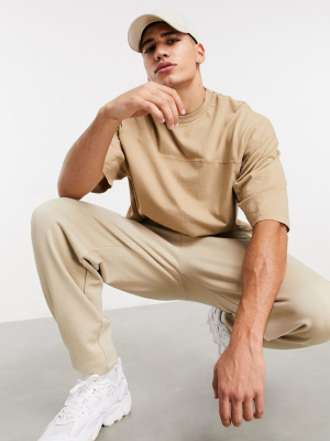 Asos Design Oversized T-shirt With Seam Detail In Washed Tan