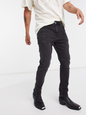 Asos Design Cropped Super Skinny Jeans In Washed Black With Abrasions