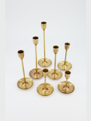 Set Of Seven Brass Candlesticks