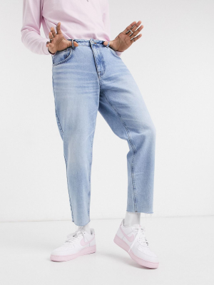 Asos Design Classic Rigid Jeans In Vintage Light Wash Blue With Raw Hem