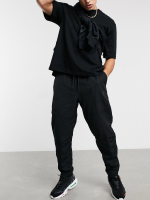 Nike Premium Essentials Winterized Sweatpants In Black