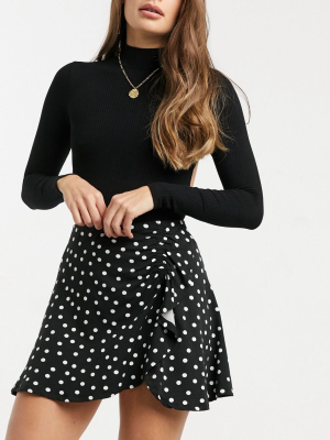 Asos Design Mini Skirt With Ruched Detail In Mono Polka Dot