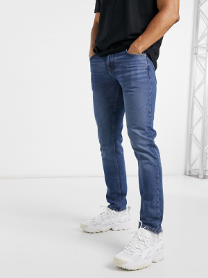 Asos Design Organic Cotton Slim Jeans In Dark Wash Blue