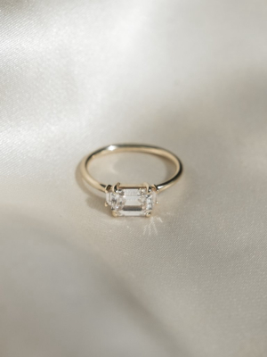 Emerald-cut Triple Diamond Ring