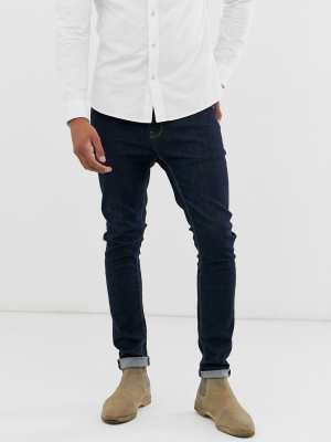 Asos Design Super Skinny Jeans In Indigo