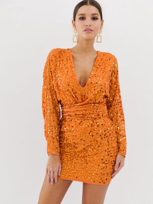 Asos Design Mini Dress With Batwing Sleeve And Wrap Waist In Orange Scatter Sequin