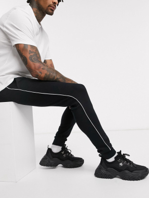 Asos Design Skinny Sweatpants With Piping In Black